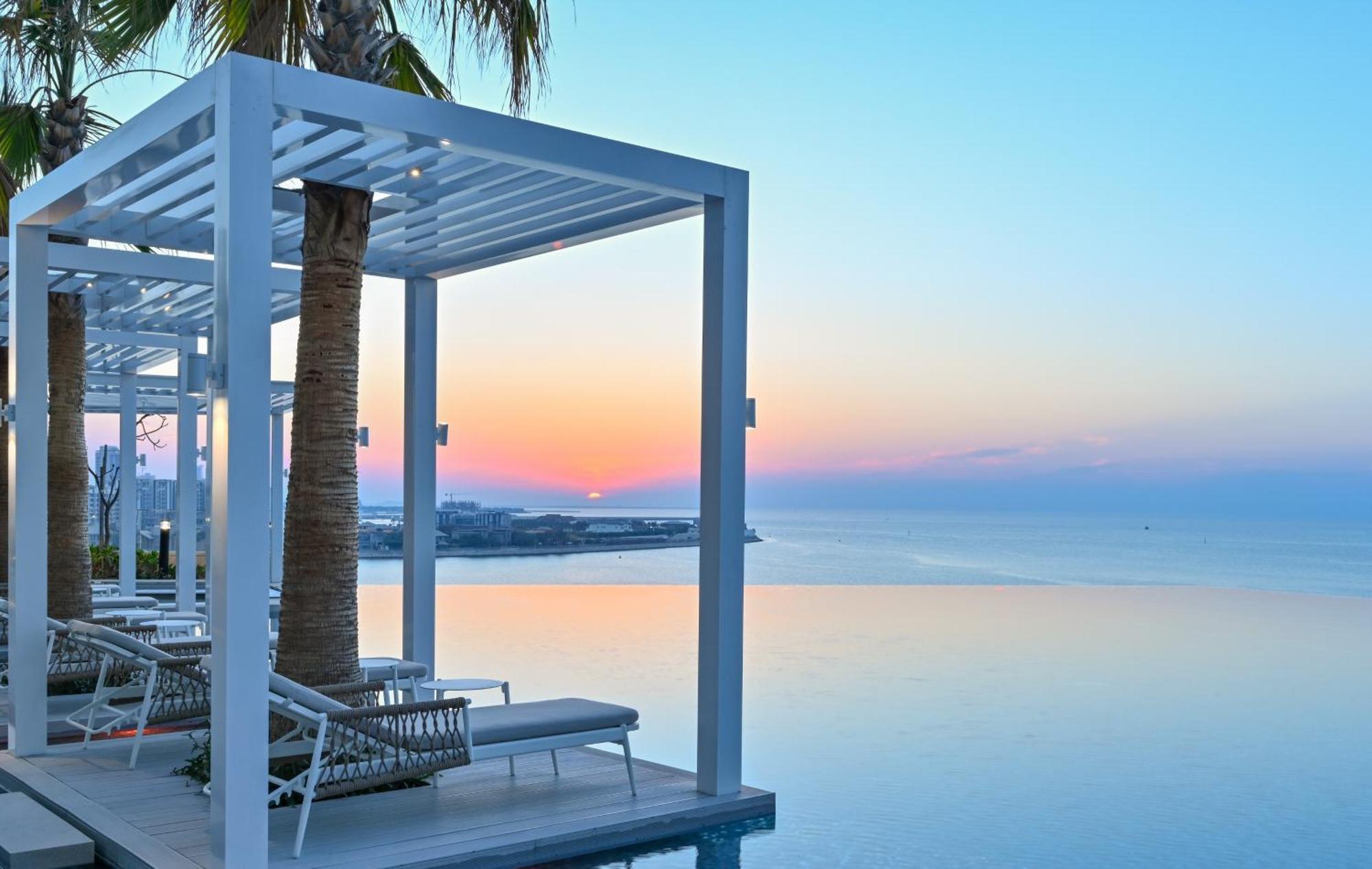 Onyx Rotana Ξενοδοχείο Μανάμα Εξωτερικό φωτογραφία Sunset at the pool